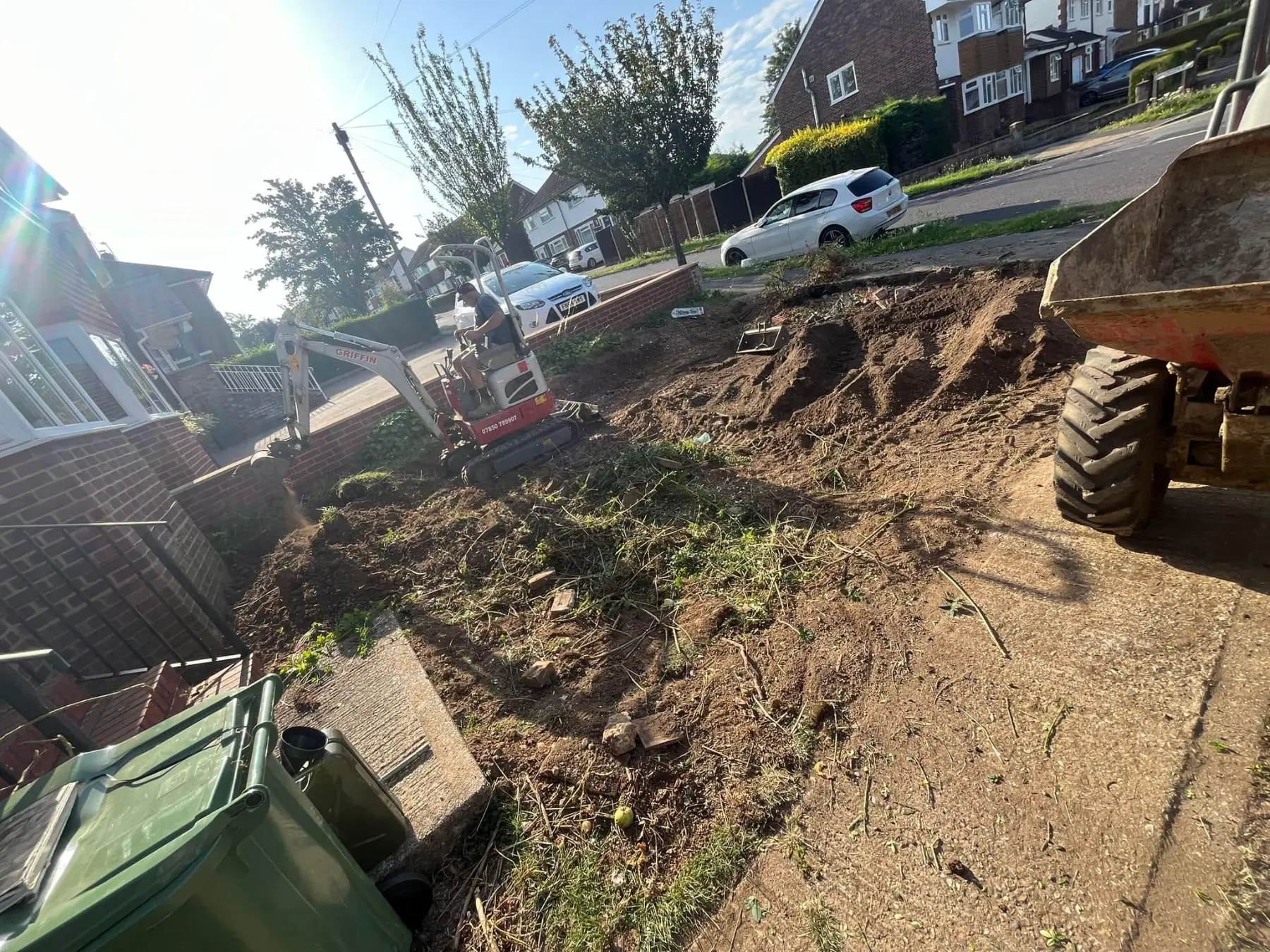 Family planting in garden